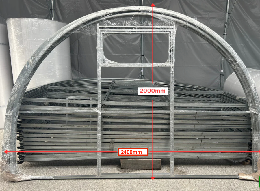 A large metal greenhouse frame structure wrapped in protective plastic, with red dimension lines and labels showing 2400mm width and 2000mm height.